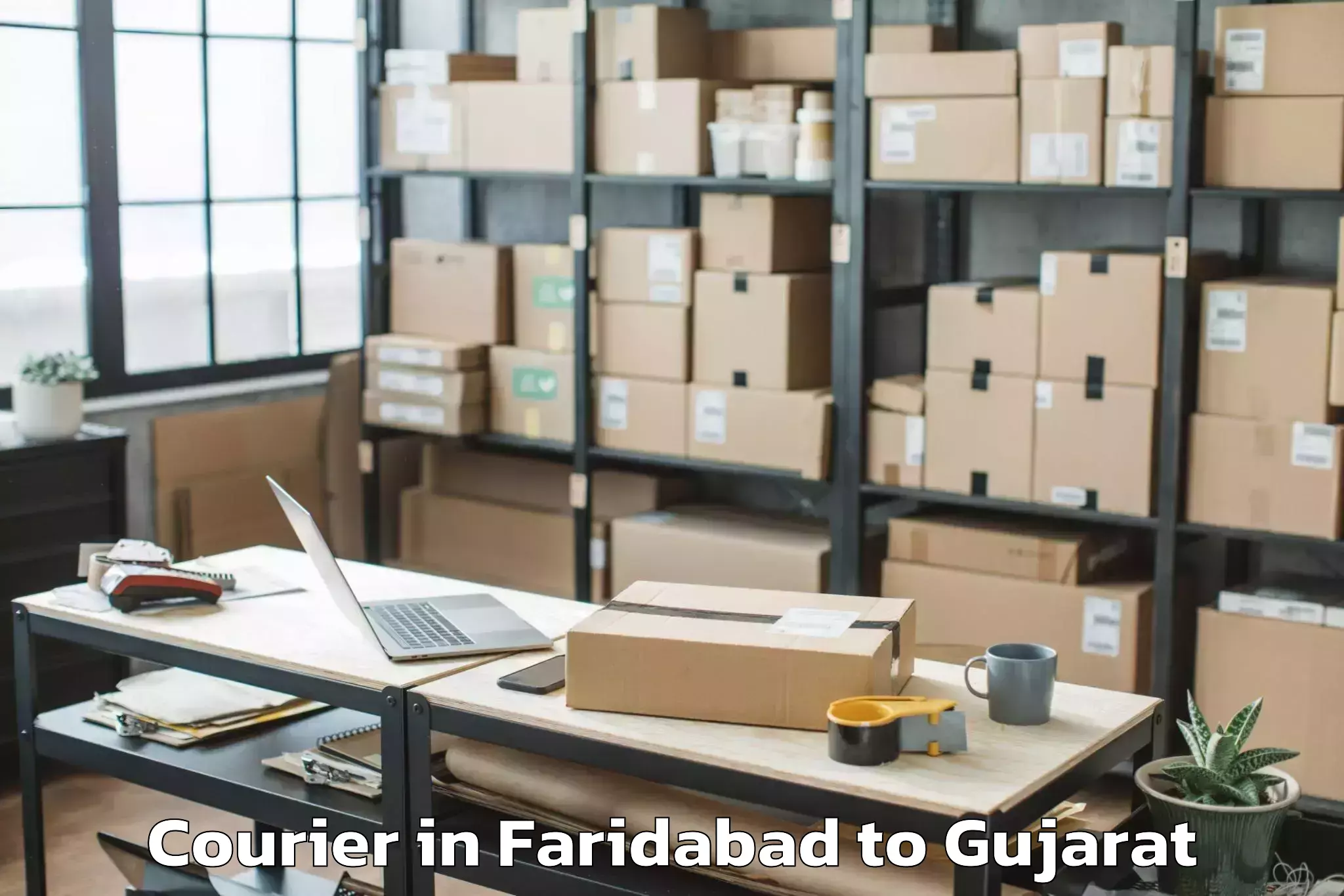 Reliable Faridabad to Jhalod Courier